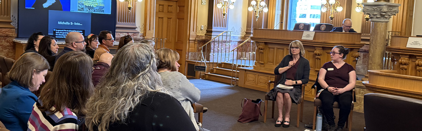 People using sign language interpreters and communication access services